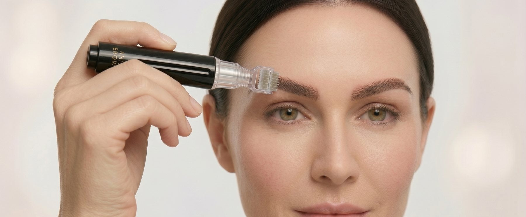 Roll the micro-roller across clean brows